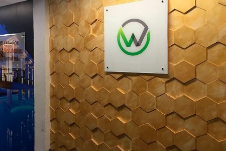 watermark kitchens showroom, concrete wall panels, hexagon panels, interior design showroom, stucco plaster, wooden wall panels,