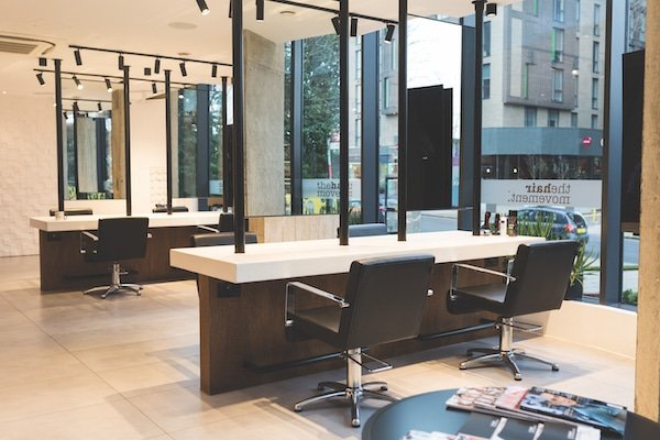 Blackened pipes in industrial style hairdresser saloon